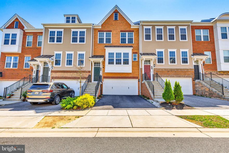 Welcome to 8027 Clovis Way, a luxurious and modern townhome in the vibrant community of Hanover, MD. Built in 2017, this meticulously maintained residence features 3 bedrooms and 2.5 bathrooms across 2,140 sq ft of living space. The gourmet kitchen is a chef’s dream, boasting stainless steel appliances, a central island, and exotic Snow White Quartz countertops paired with elegant Ash cabinetry. The open floor plan seamlessly connects the living, dining, and kitchen areas, making it perfect for both daily living and entertaining. Rich hardwood flooring throughout the main level and stairs adds warmth and sophistication, while the expansive primary suite includes a walk-in closet with custom organizers for ample storage and a touch of luxury. Residents of this community enjoy exceptional amenities, including a clubhouse with three pools—a baby pool, wading pool, and lap pool—a soccer field, dog park, tot lots, and community garden plots, with plans for a future clubhouse to enhance recreational offerings. Ideally situated between Baltimore and Annapolis, Hanover, MD, offers the perfect blend of suburban tranquility and urban convenience.