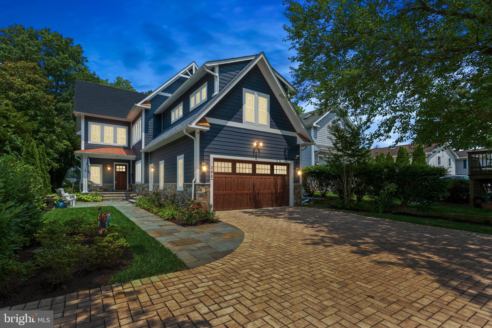 This stunning custom craftsman style home (built in 2018) situated on 3/4 of an acre of waterfront located on the Magothy River features 6 bedrooms, 4 baths, 3 fully finished levels and many, many upgrades including casement windows throughout the entire home, a whole house generator and security system. The main level offers unbelievable water views with floor-to-ceiling windows, walnut hardwood floors, coffered ceilings and a bedroom with a full bath. The gourmet kitchen opens to the family room and boasts stainless steel appliances, gorgeous quartz countertops, gas stove and stacked stone fireplace with built-in cabinets. Upstairs has 4 spacious bedrooms with 2 full bathrooms and a huge laundry room on this level. The Primary bedroom has a vaulted ceiling, his & her walk-in closets, and master bathroom with an elegant standalone tub and large separate shower with upgraded shower heads. A lovely private porch is accessed from the master bedroom allowing you to enjoy your morning coffee while soaking in the fantastic water views. The finished basement has 1 bedroom with a full bath, home theater and game area. The backyard makes this home complete with Ipe decking spanning the width of the home and an outdoor kitchen. The deep water pier with 12’ depth has a 25,000 lb. capacity boat lift and two additional jet ski lifts and docking for 2 additional vessels. There is a newly renovated guest cottage located on the property which is perfect for the in-laws or rental. The cottage has 2 bedrooms, 1 bath, living area, kitchen and its own laundry room. Blue ribbon schools a plus!