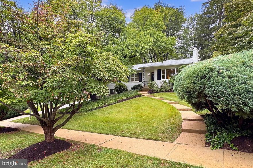 Location, Location, Location! If you’re hoping to find a special setting for your home, this is it—a gem tucked on a quiet half circle on a special street. Military Drive is high above the surrounding neighborhood with sweeping views of one of Northern Virginia’s older and unspoiled verdant neighborhoods. Ravenwood Park is a close-knit community of 256 homes—lots of kids, neighborhood events, and friendly neighbors. The house boasts a completely remodeled kitchen with recessed lights and gas cooking. A screened in porch, with cathedral ceilings and an adjacent deck that overlooks the terraced gardens and the back yard which is clearly low maintenance. The bathrooms have been updated. The living room has a gas fireplace and large picture window which offers beautiful views typical of the neighborhood. The large family/recreation room, with an adjacent half bath, has access to the carport which is built structurally like a garage. The entire lower level is finished, including the laundry, utility, and storage areas, all of which have new flooring. There’s been many updates over the last five years, and the entire house is freshly painted, including the inside of closets. Close to several shopping centers, supermarkets, and restaurants, and 10 minutes to the new Mosaic District. Nearby, almost walkable at just 1.1 miles, is the Seven Corners Transit Center with direct Metro Busses to EFC Metro, Ballston Metro, Vienna Metro, Tysons Metro, and direct connections to the rest of the Metro system.