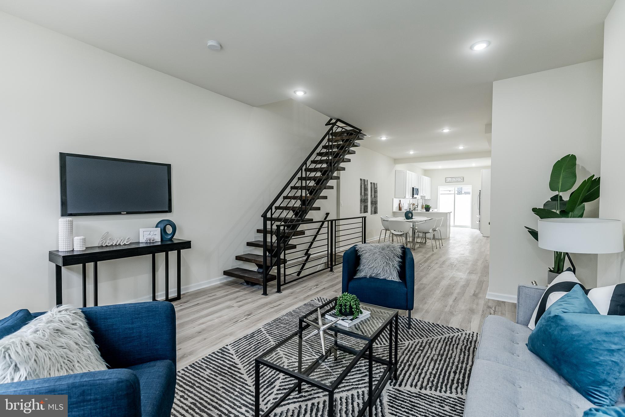 Welcome to 1745 S 19th Street — a fully renovated South Philly gem nestled in the heart of booming Point Breeze. This thoughtfully designed 3-bedroom, 2.5-bathroom home offers the perfect blend of contemporary finishes, energy efficiency, and classic city charm. Every inch has been reimagined to elevate your lifestyle while preserving the character that makes this neighborhood so beloved.
Step into a bright, open-concept layout that features elegant luxury laminate flooring, recessed lighting, and custom floating staircases that make a bold architectural statement. The chef’s kitchen is outfitted with quartz countertops, stainless steel appliances, a built-in wine cooler, and sleek cabinetry — perfect for both entertaining and everyday functionality. The home also includes a spacious finished basement with a washer and dryer, offering flexible use as a home office, media lounge, or guest suite. A mini-split HVAC system ensures personalized climate control throughout, while energy-efficient windows help keep utility costs low and natural light flowing.
Outdoor living is just as inviting with a private rear patio, ideal for morning coffee, urban gardening, or summer evenings under the stars. The home’s layout, storage, and finishes provide incredible versatility for growing households, remote workers, or buyers simply seeking move-in-ready quality in a highly desirable location. Home Warranty Available!
Situated in historic South Philadelphia, Point Breeze offers walkable access to parks, grocery stores, public transit, and a growing list of cafés, bars, and dining hotspots. Commuting is a breeze with easy connections to Center City, University City, and East Passyunk Avenue, while the community itself is rich with culture, local pride, and revitalization energy.
Best of all, this home qualifies for first-time homebuyer grants and down payment assistance programs, making it a smart, affordable opportunity for buyers looking to plant roots in a neighborhood on the rise.
Don’t miss your chance to own a turn-key home in one of Philadelphia’s most dynamic communities. Schedule your private tour today — this one won’t last long!