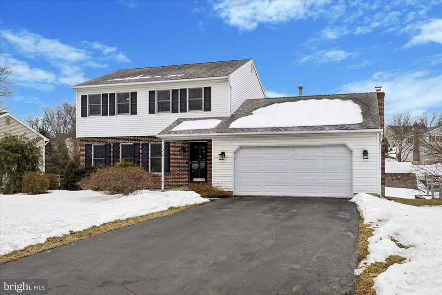 Discover the charm of this stunning Colonial-style home, perfectly designed for modern living. This meticulously maintained home boasts 1,944 sq. ft. of finished space on the first two floors plus another 600+ sq. ft. of finished basement offering a harmonious blend of comfort and style. Step inside to find a welcoming atmosphere enhanced by plush carpeting and elegant ceramic tile flooring. The heart of the home features a spacious eat-in kitchen, equipped with essential stainless steel appliances including a gas oven/range, microwave, and dishwasher, making meal prep a delight. Relax in the cozy living room, where a beautiful stone fireplace creates a warm focal point for chilly evenings. This home offers three generously sized bedrooms, including a primary suite with an en-suite bath for added privacy. With two full bathrooms and a convenient half bath, morning routines are a breeze. Enjoy the convenience of the recently fully finished basement, ideal for a home office, playroom, or additional living space. Step outside to your private deck, perfect for summer barbecues or quiet evenings under the stars. The attached garage and ample driveway parking provide plenty of space for vehicles and storage. This home also features a charming shed for additional storage needs. With its excellent condition and thoughtful features, this home is ready to welcome you. Don't miss the opportunity to make it yours!