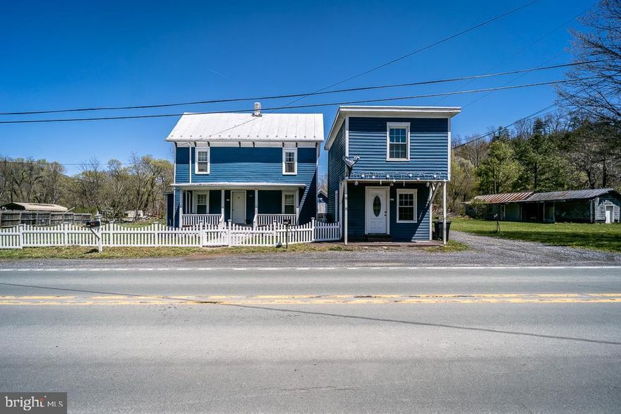 HOUSE WITH SEPARATE APARTMENT! This lovely home located in the heart of Brandywine offers a mostly fenced yard with plenty of privacy, off road parking, garden space, and guest house/apartment. Guest house boasts one bedroom, one bathroom, small kitchen area, window AC unit. Enjoy this extra space as a long term or short term rental! Outdoor wood furnace heats home and apartment (2018). Hot water heater in the main home is run on electric or wood furnace heat. New stove/range, dishwasher, shed, and stove top in apartment. Septic pumped 2023. Newly installed generator interlock switch. Conveniently located near dining and shopping. Approximately 35 minutes to Harrisonburg or 20 minutes to Franklin. Great buy for a home and a rental with large yard and garden space.