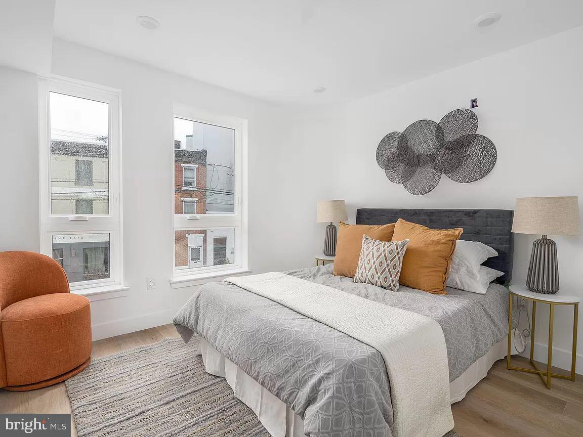 Location! Location! Location! Fifteen38 Flats is the newest luxury boutique condo building in the heart of Fishtown, next door to some of Philly's top restaurants, bars, and amenities. This expertly designed condo development features 12 residences offering 4 unique layouts, all with 2 bedrooms and 2.5 bathrooms. Unit #2A is a large home spanning 1,200 sqft over one floor. The kitchen will include custom white cabinetry, quartz countertops, stainless steel appliances, and a center island that opens to the bright, airy living room. Each bathroom will be tastefully designed with curated tiles, vanities, and black fixtures. The building itself will be incredibly attractive as it has a private, secure entry off Frankford Avenue. The ELEVATOR will take you up to each floor as well as the massive common rooftop deck with a dramatic Center City Skyline view and a large dog run for your four-legged companion. The building is framed, walkable, and ready for tours. Deliveries are expected in Q1 2024. *Photos/renderings are for marketing purposes only and may not portray actual finishes. Photos include multiple units. Taxes are TBD (estimated $1,000/year) & square footage is the buyer's responsibility to verify.