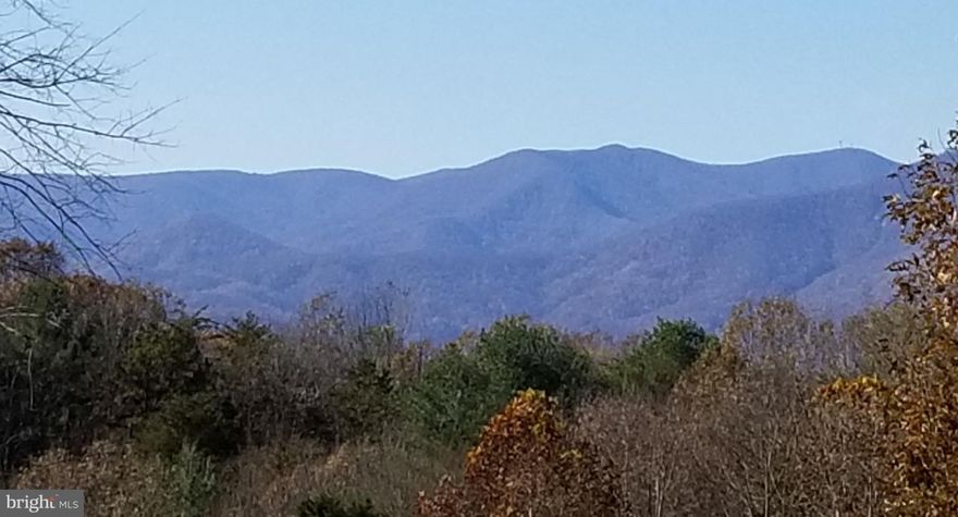 Come see the most sought after views in Madison County.  Build your dream.  The sky is the limit with this property.  This is a portion of 22-54 that has been added to 22-55.  Please see plat in Documents.