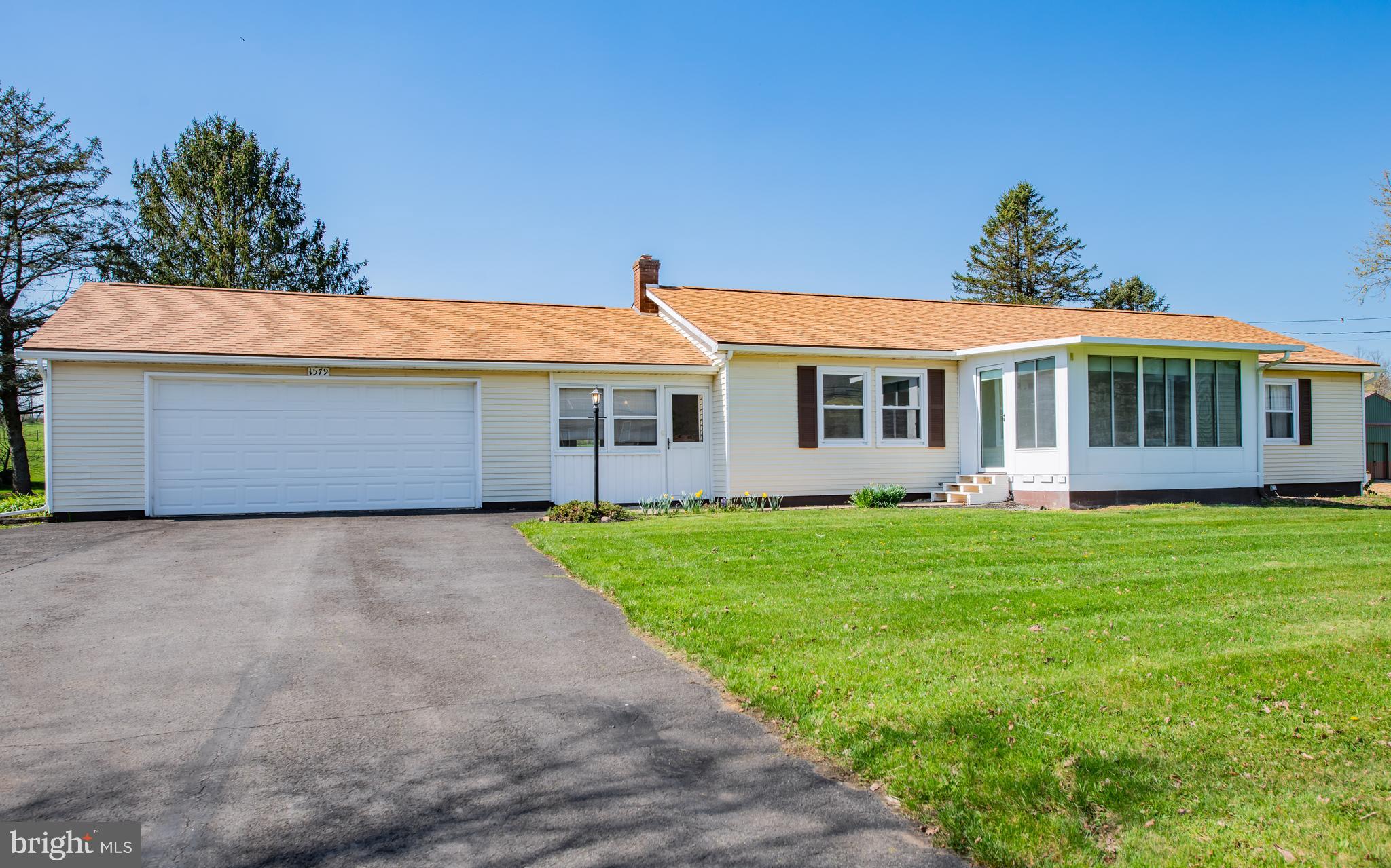 Enjoy space, comfort, and country charm with this beautifully updated home set on 2.56 scenic acres. Step inside to find fresh paint throughout and brand-new flooring in the bedrooms, living room, and dining area—move-in ready and waiting for you! You'll love the spacious eat-in kitchen plus a separate dining area, perfect for hosting family and friends. The enclosed heated front porch offers a cozy spot to relax and enjoy the peaceful surroundings. Outside, the property features an attached 2-car garage AND a 36x24 pole barn—ideal for storage, hobbies, or workshop space. This is the perfect blend of comfort and functionality with plenty of room to grow!