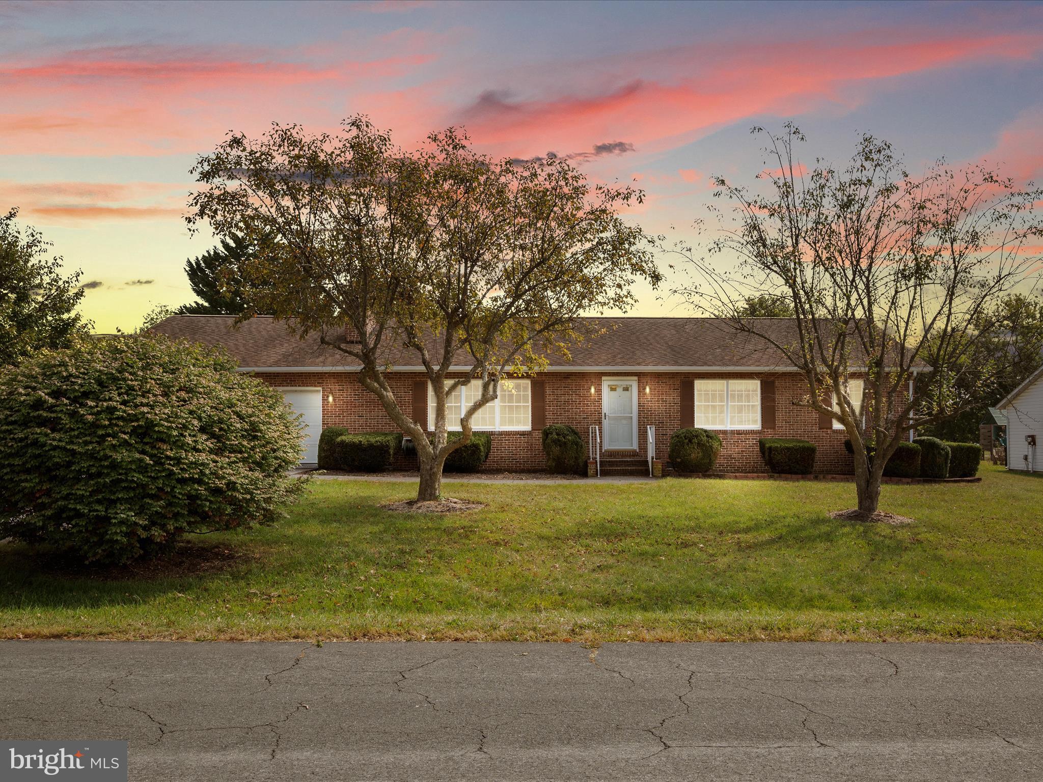 This charming, extremely well-cared-for one-owner home offers the ease of single-level living and plenty of potential. With 3 bedrooms and 2 full baths, it features a spacious living room highlighted by a cozy gas fireplace and built-in bookcases, perfect for relaxing or entertaining. The large kitchen, complete with abundant cabinetry and Corian countertops, flows seamlessly to a formal dining room ideal for gatherings. Step outside to enjoy a fully fenced backyard with a low-maintenance composite deck, perfect for outdoor living. Nestled in the established and highly sought-after Wakeland Manor subdivision—with no HOA—this home is a rare opportunity to make your own.