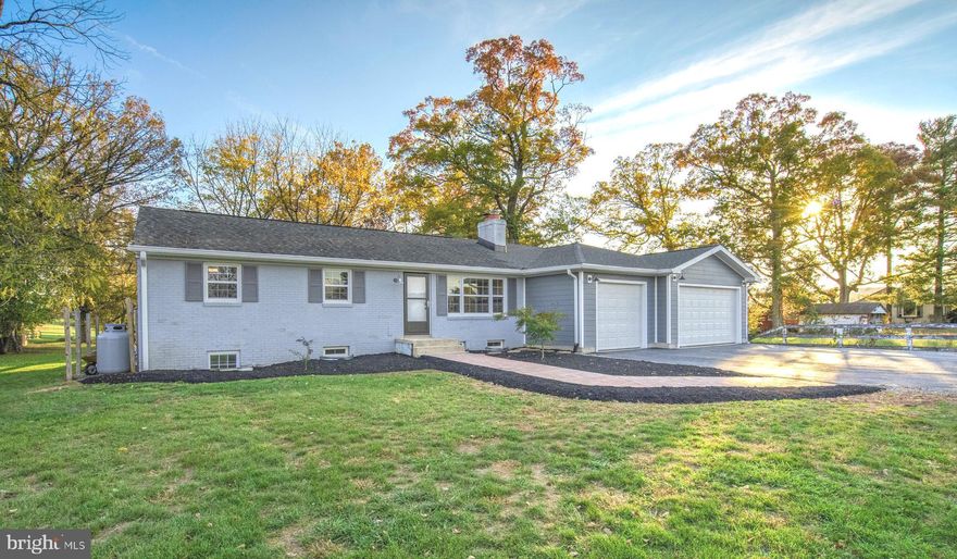 Beautifully renovated and extensively updated 4 bed 3 full bath rancher sited on a well manicured acre of land in Leesburg. From the moment you pull in the driveway you will begin noticing just how unique this home truly is. The brand new brick paver walkway brings you to the front door. Step inside and be greeted by warm white oak floors that have been professionally refinished and run throughout the living room, hallway and all bedrooms on the main level. To the right is your living room with converted gas fireplace and contemporary brick surround. Move on to the kitchen that was tastefully renovated with soft close cabinetry, granite counters, stainless appliances and complementary backsplash. Off the kitchen is a great dining or office space and down the hallway you will find 3 bedrooms including your owners suite complete with slider door accessing a new rear deck overlooking the back yard. All three bathrooms were remodeled in 2016 and the entire main level was recently painted to complement the space. Now to the real star of the show! Completed in 2023 is the oversized 3 car garage addition which was thoughtfully designed to blend seamlessly into the existing home. The design inside the garage was configured to suit a multitude of ways to maximize the value of the property. Access to the fully finished lower level is through an enclosed hallway inside the garage giving you the flexibility to use the space as needed. In-law suite, one bed one bath rental unit, a place for friends to stay when visiting or just use it as part of your home! The space includes its own kitchen, full bath, washer/dryer, dedicated hot water heater and electrical service. Mini split heat pump systems were then installed at both the upper and lower levels to allow for zoned conditioning. Once you've seen all the interior has to offer head out back and envision entertaining in your screened in porch which was also completed in 2023. Verizon Fios currently in use making this home turn key ready! Absolutely a must see. Schedule your showing today!