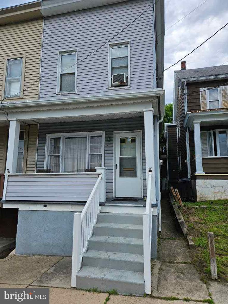 The charming end of a row estate AS-IS  home in the heart of Dutch Hill  hosts a front porch overlooking  the local little league fields, with 3 bedrooms and a full bath it is ideal for your growing family. Wall to wall carpet making a cozy home setting, eat in kitchen and yard for your family to enjoy, all bedrooms have their own closets which is a bonus in old homes.    Only thing needed is your family and your belongings to make this a home for your family. Oil burner serviced regularly and zoned for both floors.    Being within the Tamaqua School District eligible families take advantage of the LCCC college program.