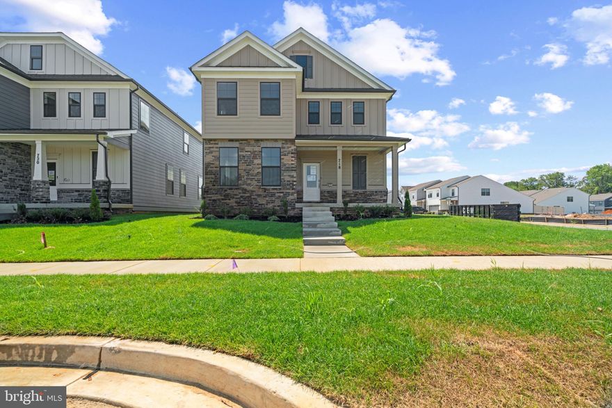 Dreaming of your perfect home with just the right amount of space, in a location close to downtown Frederick? Look no further than this home! An on trend modern farmhouse exterior, complete with front porch, black trim windows, and useable side yard, this home and its curb appeal gives you all the feels! But, it does not stop there! The inside is breathtaking and a showstopper than leaves nothing to be desired. The front level is complete will wall to wall luxury plank floors; an entertainer’s dream Gourmet kitchen accentuated with stainless steel appliances, a built-in wall oven and microwave, quartz countertops, and a trendy herringbone, mosaic glass backsplash. The owner’s suite oozes luxury with a modern European on-suite bathroom fit for a spa. oversized walk in closet has a private entrance to the upstairs laundry. Two more spacious bedrooms with private on-suites and walk in closets round out the second level. The basement is finished with an oversized rec room, larger basement bedroom and full bathroom. Complete with a private front covered porch, it is the perfect place for spring evenings and cocktails. This home cannot be overlooked! Contact us today to schedule a showing and to ask about our amazing incentives!