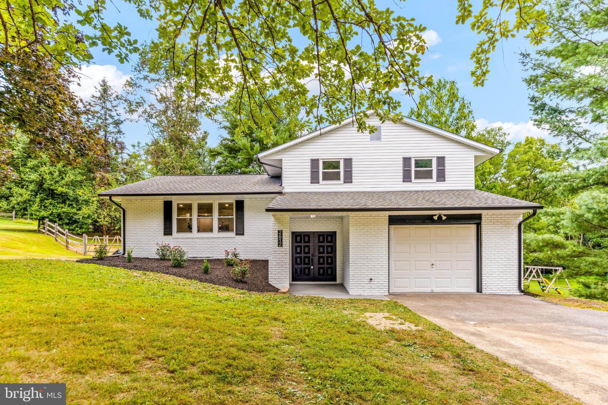 Welcome to 2612 Jeffrey Lori Drive, a beautifully renovated home that blends modern updates with classic comfort in an incredible location! Completely redone from top to bottom, this home features brand-new flooring, fresh paint throughout, fully renovated bathrooms and kitchen, new windows throughout, and a brand-new HVAC system for year-round comfort. The main level has been reconfigured to create an open-concept great room with a seamless flow between the living, dining, and kitchen areas. The kitchen shines with a spacious island, deluxe quartz countertops, brand-new cabinets, and all-new appliances. From the kitchen, step through the new sliding glass door to enjoy a large patio overlooking a roomy half-acre yard—perfect for outdoor gatherings, play, or gardening.
Upstairs, you’ll find three spacious bedrooms, each with its own ceiling fan. The primary suite offers a private en suite full bathroom, while the hall bath features a convenient tub/shower combo, both fully renovated with elegant tile work and modern finishes. The lower level provides even more living space with a generous family room centered around a cozy fireplace, along with a combined half bath and laundry room. The bottom level remains unfinished, offering excellent storage options. A one-car garage provides additional parking or storage flexibility.
Located in a quiet, established neighborhood with no HOA restrictions, this home offers a peaceful country feel while remaining close to shopping, dining, commuter routes, and more. Add in the highly rated schools in a sought-after district, and you’ll see why this property is such a rare find.