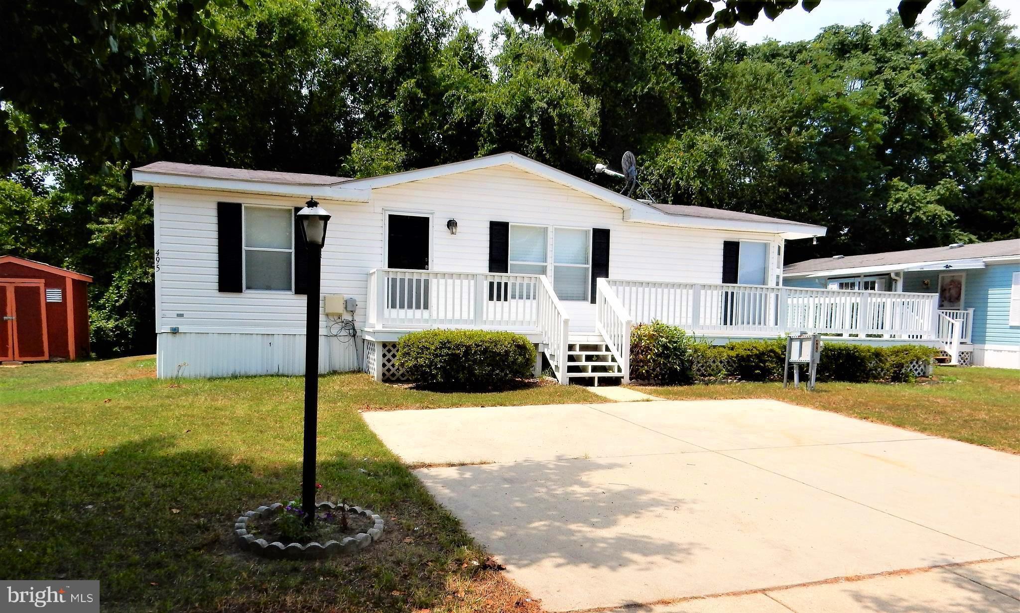 Nice & Affordable Doublewide in Sought after Boones Estates. Home sits on Great Lot in Quiet Culdesac. Big Eatin Kitchen, Living Room & Master BR w/Private Bath. Updates Include New Gas Range, Carpet & Paint. Home Backs to Woods and is Nicely Landscaped w/Large Front Deck and Secure Storage Shed. Community Perks Include Swimming Pool, Basketball, Tennis Courts & Two Tot Lots. This One Won't Last!