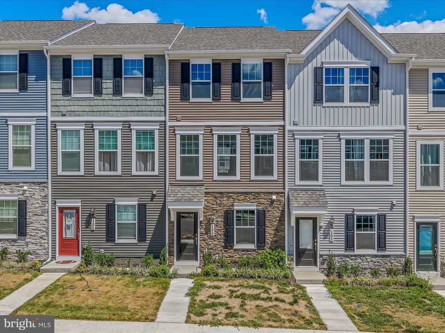 BRAND NEW TOWNHOME! This property has never been lived in, in an amazing commuter location. The home features 3 pristine levels and a rear 1 car garage with off street parking for 2 additional cars. Inside the front door you have a nice rec room with garage access. This space includes a large laundry closet that keeps your machines nicely tucked away. The main level of the home features LVP floors throughout. The bright dining room in the front of the home is accented with lovely picture frame molding. Beyond this you have the open kitchen with upgraded cabinets and granite counters. The large island provides extra prep and storage space. You have a convenient half bath with pedestal sink on the main level. The kitchen is open to your spacious living room. It features bright windows, recessed lights, and picture frame molding. This space includes access to your rear deck, perfect for soaking up the sun on a warm day. Upstairs you have a carpeted hallway. Bedroom 1 features carpet, a large closet and overhead light. The hall bath features a tub/shower with tile surround and single bowl vanity with granite counters. The large primary suite features carpet and overhead lighting. A large closet provides ample storage space for all your belongings. There is a private ensuite bath with tub/shower with tile surround and single bowl vanity with granite countertop. This home has the space you're looking for in a great location! Call for more information today!