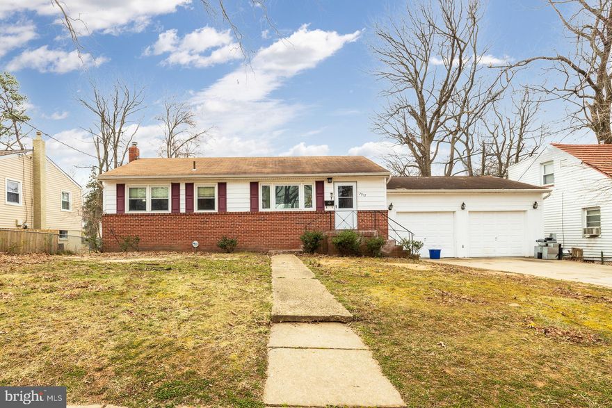 Welcome Home! This home features 4 bedrooms,  spacious living room & dining room. The large finished basement has plenty of room for storage. You will love the  2 car garage and nice flat backyard , with deck  for entertaining.  Also, this property is only 20 minutes from National Harbor & DC.