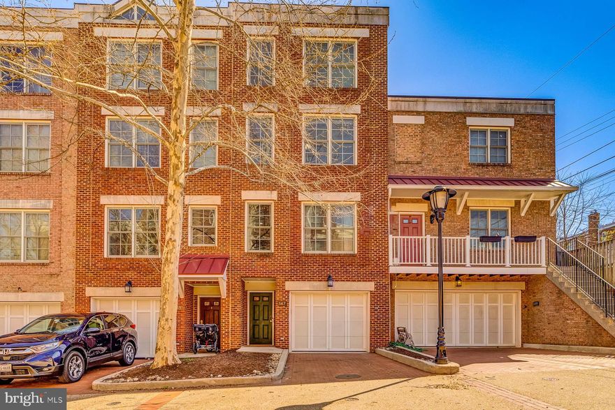 OPEN HOUSE CANCELLED! Stunning, turnkey townhome in an incredible location! Nestled between sought-after Del Ray and Potomac Yard, this spacious rowhome includes tons of updates, a 1-car garage and convenience to everything you could need. Step into the main level where you’ll find hardwood floors throughout and the gorgeous kitchen with a farmhouse sink, custom tile backsplash, quartz countertops, a built-in coffee/wine bar and stainless steel appliances. Enjoy dining in the breakfast nook or in the adjacent dining room with ample room for guests. The light-filled living room with cozy fireplace is the perfect place to relax with friends or family. Upstairs, you’ll find two large bedrooms, a laundry area with a newer washer and dryer (2021) and a contemporary full bathroom with double vanity and shower/tub combo. The primary bedroom suite features a large walk-in closet and an ensuite bathroom with double vanity and walk-in shower. The upstairs loft makes a fantastic home office or reading nook, and leads out to the rooftop deck, ideal for enjoying sunsets or unwinding after work. Fully finished basement is a great space for a rec room and features a new half bathroom (2023) and leads out to the fenced flagstone patio. Tons of updates including a new water heater (2021), two new AC units (2022), a new furnace (2022), and more! Residents of the Preston enjoy access to the amenities in the adjacent condominium building, including a fitness center. Mere blocks to all the shops and restaurants on “The Avenue” in Del Ray, including Stracci Pizza, Los Tios, Cheesetique, and Piece Out Pizza. Super convenient to the many amenities in Potomac Yard like Target, Barnes & Noble, Home Goods, Giant Food, and the upcoming metro station! Easy access to the Beltway, Old Town, Crystal City, and Washington DC – this location truly can’t be beat.