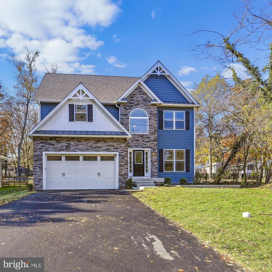 NEW CONSTRUCTION  !!  WEST RIVER 1 FLOOR PLAN with Finished Basement  FEATURES FAMILY ROOM, BEDROOM, FULL BATH, UTILITY ROOM, STORAGE/POSSIBLE FUTURE DEN USE.   THE LOWER LEVEL OFFERS THE PERFECT SETUP FOR A POSSIBLE INLAW SUITE   LOT IS APPROX 300' DEEP AND BACK UP TO THE VETERANS CEMETARY .40 ACRE

CRAFTSMAN STYLE 3 LEVEL COLONIAL!  5 BEDROOM 3.5 BATH West River 1 Model.  Located in Water Privileged Arden On The Severn!    Open Floor Plan features Oversized Walk-In Pantry off of Kitchen, Butler Pantry with Wet Bar, Upper-Level Laundry Room with Dual Access to Primary Bath and Hallway.  Upgrades include a Stone Fireplace in the Family Room, Soft Close Cabinets, Granite, a Kitchen Island, Luxury Vinyl Planking, Tile Bathrooms, Garage Door Opener, and CRAFTSMAN Finishes!  Electronics Hub with WIFI capability for security, garage door, and more!!