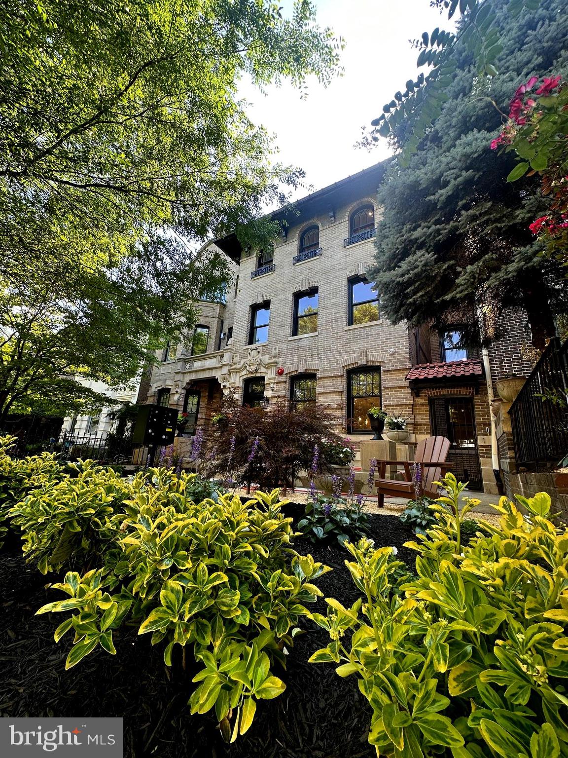 A truly stunning 1230 sq ft all new 2br/2ba within a classic extra wide Tuscan style Mansion on one of Dupont's most coveted and quiet streets! Step through your private entrance into a Wow of a floor plan with a huge gourmet kitchen boasting top of the line Thermador stainless steel appliances, loads of counter space on a grand breakfast bar island, separate wine fridge, & great cabinet storage. Other fine features include 9 inch hardwood floors, Sonos sound, recessed and cove lighting, custom moldings & trim, wonderful closets, and sumptuous marble tiled baths! The primary suite is oversized and the 2nd bedroom is quite spacious as well which leads out the rear to a private enclosed patio!! The living room has classic windows overlooking the gorgeous front gardens and there is a large dedicated dining space as well! The unit has an extremely low condo fee and lives like a house! Deeded Parking space available for 40k. This location make this a must see!!!!! Taxes are approx. & builder's contract is required - call with questions.