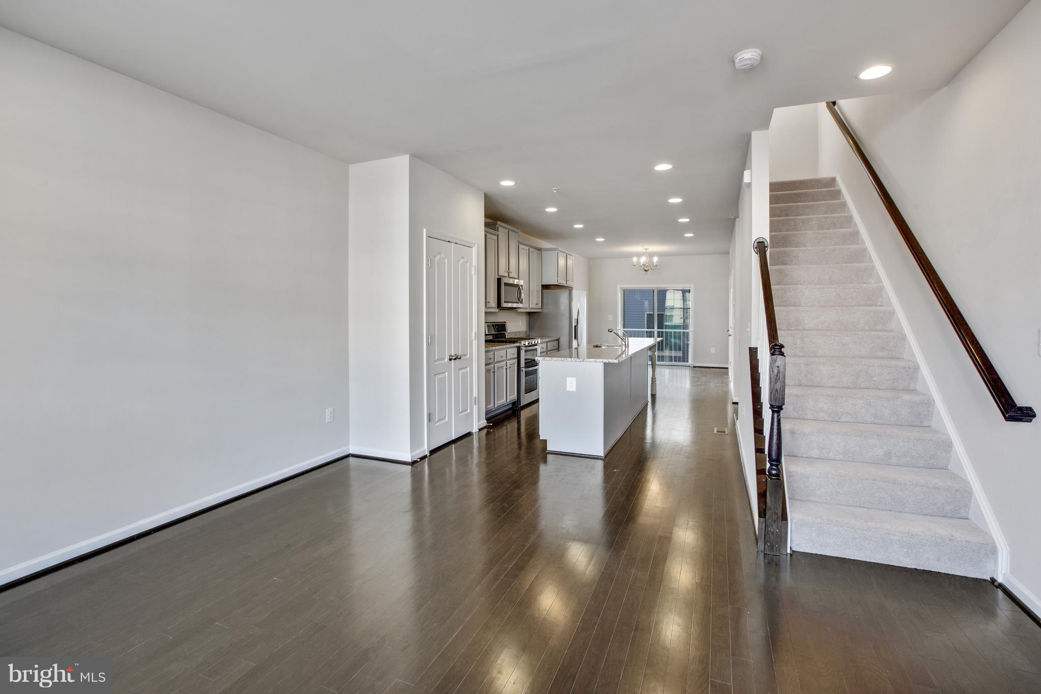 One of the last homes remaining at Tanyard Cove! Beautiful townhome offering 3 levels of luxury living space. 9ft ceilings will provide your with an open & airy feel while inside you are greeted by a gourmet kitchen w/SS appliances, granite counters, & abundance of natural light. Your Owner's suite awaits w/ plush carpeting, dual vanities walk-in shower & soaker tub. Photos are of similar home.