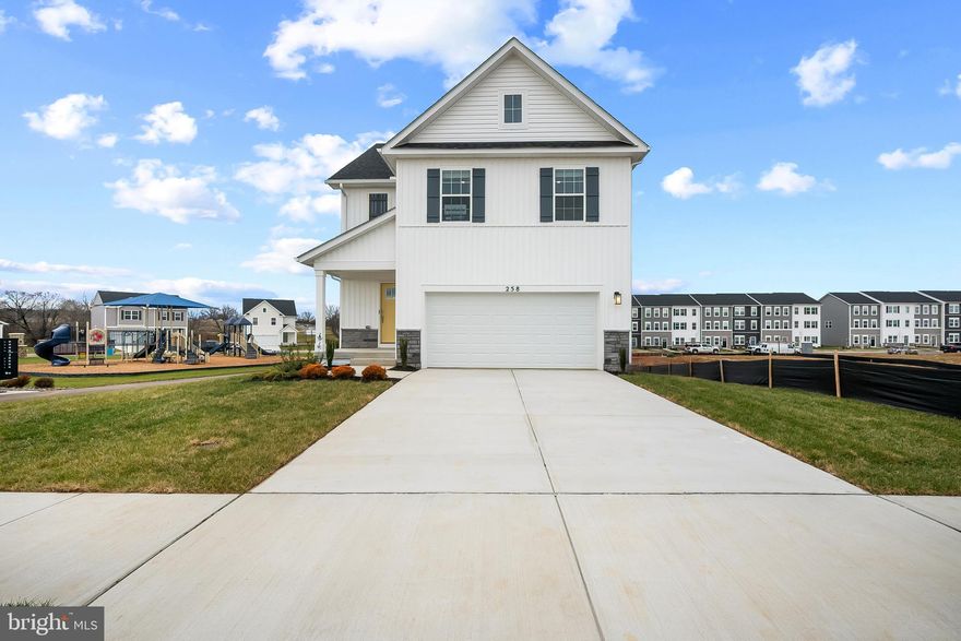 Welcome to Riverpointe, Charles Town’s newest community! This beautiful two-story Pine Colonial offers 1,953 sq. ft. of well-designed living space with 4 bedrooms, 2.5 baths, and a 2-car garage.
The open-concept main level features a spacious family room, and a modern kitchen complete with stainless steel appliances, quartz countertops, and a large eating area—perfect for everyday living and entertaining.
Upstairs, the primary suite is filled with natural light and includes a walk-in closet plus a private bath with dual vanity. Three additional bedrooms provide plenty of space for family and guests.
The lower level, walk-out basement is partially finished with carpet ready for those loving sports. Make this your theatre tv room.  There is also a rough-in for future bath and egress window.  

Enjoy a fully sodded yard, ready for outdoor fun, along with a prime commuter-friendly location just minutes from Northern Virginia, Maryland, and DC. Restaurants, shopping, and parks are all nearby for added convenience.
With its thoughtful layout, stylish finishes, and move-in ready appeal, this home is waiting for you.  Photos may be of a similar home/floorplan if under construction.  Schedule your tour today!  Delivery time is August 2026.