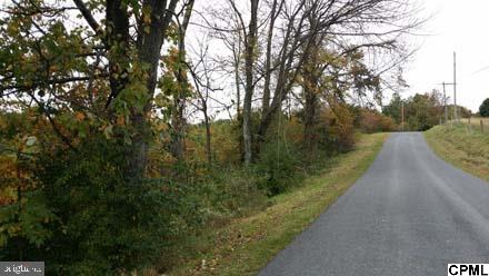 Juniata Co. Wood 43.40 AC Lot secluded. Build Dream Home or Hunting Camp. Wood Lot including timber,conveying with perk test & survey,Electric available,4,000 road frontage & restricting commercial,animal operations. Taxes to be determined at settlement.
