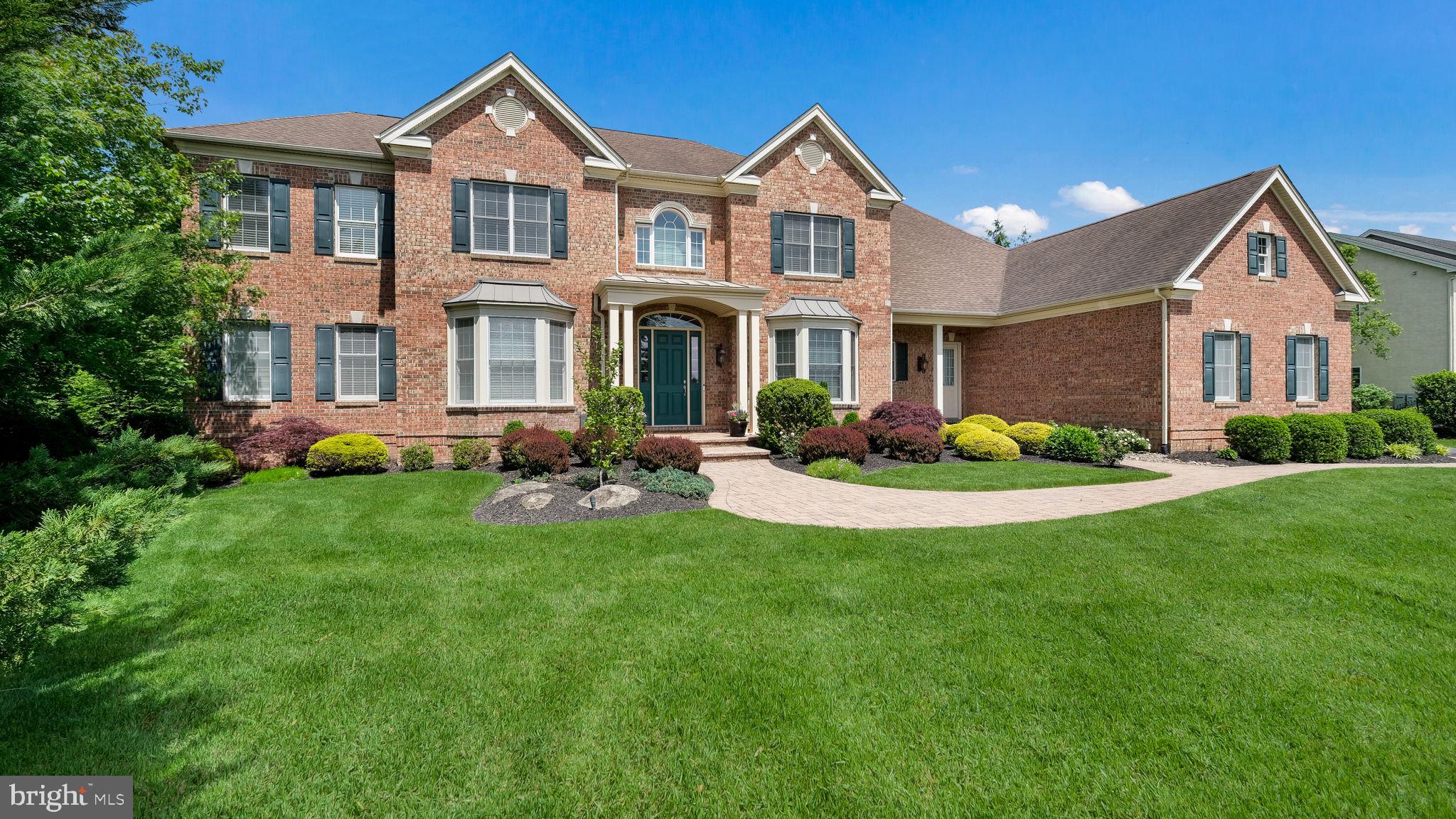 Stunning Toll Brothers Chamberlain Model in Prestigious Spring Valley Estates
Welcome to this exceptional Toll Brothers Chamberlain Model, a breathtaking estate home located in the highly sought-after Spring Valley Estates community. Perfectly situated in the heart of Buckingham Township and within the acclaimed Central Bucks School District, this 5 bedroom, 6.5 bathroom residence offers over an acre of luxurious living with an unmatched level of craftsmanship and detail.
As you step through the front door, you're greeted by a grand foyer with soaring ceilings and a sweeping staircase that sets a tone of elegance and sophistication. Custom moldings and built-ins flow throughout the home, adding richness and architectural charm. The formal dining room and spacious living room, both designed with entertaining in mind, offer a warm welcome to guests. The living room features a cozy fireplace and opens into a bright and airy conservatory, adorned with tile flooring and expansive windows that overlook the beautifully landscaped backyard.
The heart of the home is the gourmet eat-in kitchen, thoughtfully designed for both everyday living and hosting. This culinary space is equipped with upgraded appliances, custom cabinetry, and granite countertops, all beautifully accented by tile flooring. Just off the kitchen is the inviting family room, which features custom box beam ceilings, wood flooring, and a second fireplace that serves as the perfect focal point for gathering and relaxation. Beyond the family room, enjoy the study, with picturesque views of your backyard retreat.
The finished lower level offers an impressive extension of the living space. Whether you're watching the big game or entertaining at the custom-built bar, this level delivers comfort, versatility and style. A dedicated area has been thoughtfully designed to accommodate a home gym - perfect for fitness routines, strength training or yoga. With a full bathroom and ample storage, the basement is as functional as it is inviting.
Upstairs, the luxurious primary suite provides a peaceful retreat. This private sanctuary includes a charming sitting room, a generous walk-in closet, and a spa-inspired bathroom complete with dual vanities, a soaking tub, walk-in shower, and a separate water closet. Four additional bedrooms, each with their own en-suite bathrooms, offer privacy and space for family and guests alike.
Step outside and discover your own personal resort. The meticulously landscaped backyard features a stunning custom pool and a fully outfitted pool house complete with a changing room, bathroom, and outdoor rinse-off area. Whether you're hosting a summer party or enjoying a quiet evening swim, this outdoor space offers the perfect escape.
Located just minutes from the boutique shopping, fine dining, and cultural attractions of Doylestown and New Hope, and with easy access to Routes 202, 313, and 611, this home effortlessly blends luxury living with everyday convenience. Don’t miss your chance to own a masterpiece in one of Buckingham Township’s most prestigious and private communities. Schedule your private showing today.