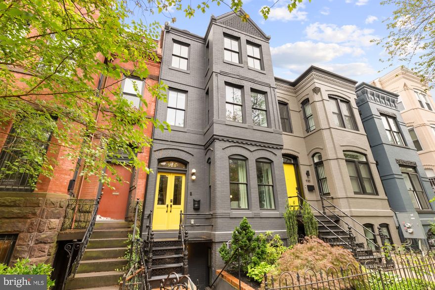 Welcome to a truly exceptional four-level residence that redefines luxury DC living. Impeccably renovated from top to bottom, this home masterfully balances timeless character with refined, contemporary design and unparalleled craftsmanship.

Step inside to find soaring ceilings, oversized windows, and sun-drenched herringbone hardwood floors. Historic details like exposed brick, marble fireplaces, and extensive millwork blend seamlessly with modern upgrades including designer lighting, a built-in speaker system, and custom window treatments. The heart of the home is a chef-grade kitchen designed to impress even the most discerning cook.

The primary suite is a private sanctuary, featuring a dedicated entrance hall, custom walk-in closet, separate office, and a spa-inspired bath with heated floors, freestanding soaking tub, oversized shower, double vanity, and private water closet.

Two additional bedrooms—each with en-suite baths—offer comfort and privacy, while a top-level lounge provides flexible space for relaxing or entertaining.

On the lower level, a fully outfitted in-law suite includes front and rear egress, a full kitchen, and private living space—ideal for guests, an au pair, or rental income.

Outdoor living is just as impressive. Two expansive roof decks offer sweeping views of the city skyline and DC monuments, perfect for entertaining or unwinding. A rear deck with built-in grilling kitchen, a beautifully landscaped front entry, and two-car parking with an EV charger round out this rare offering.

Located on a charming tree-lined street near French Street Park, Logan Circle, 14th Street, and downtown, this home delivers elevated living in one of DC’s most sought-after neighborhoods.