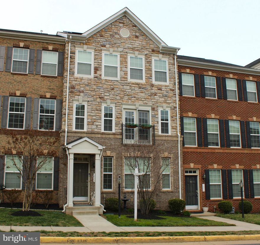 Welcome to this beautifully designed home featuring three finished levels, four bedrooms, and 3.5 baths, offering the perfect blend of comfort and style.

The gourmet kitchen is a chef’s dream, boasting stainless steel appliances and ample counter space. A charming bump-out dining area with a cozy fireplace adds warmth and elegance, making it ideal for gatherings.

A very spacious primary suite featuring a sitting area, a luxurious en-suite bath with a dual sink vanity, a soaking tub, and a separate shower for ultimate relaxation.

Enjoy outdoor living on the expansive deck that leads into the dining/kitchen area. Perfect for entertaining

Conveniently located near shopping and dining, this home offers easy access to everything you need.