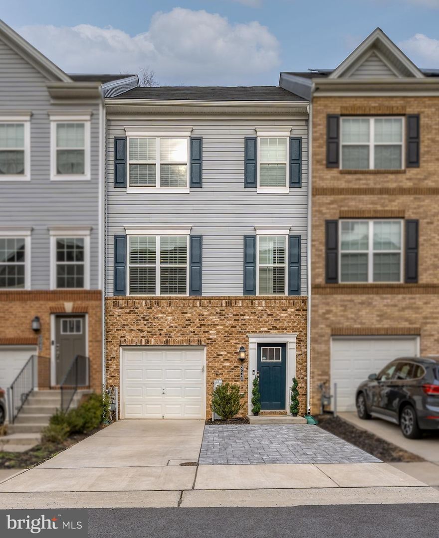 Open house Sunday Feb 20th from 12-2pm. MUST SEE! GORGEOUS LUXURY and only 3.5 years YOUNG! 4 bedrooms, 3 full bathrooms, 1 half bathrooms,1 car garage with 2 additional parking spaces in front is located in the Spring Creek community of Laurel. Enjoy luxury laminated flooring on the main level with living room, high 9 foot ceilings throughout, gourmet kitchen featuring granite counter tops, stainless steel appliances and deck off the kitchen area perfect for entertaining. The lower walk-in level features one bedroom with a full bathroom and walkout to back yard, perfect for those looking for a bedroom on walk-in level. The upper level has master bedroom with walk-in closet, master bathroom with separate shower and dual vanity. The upper level also has 2 additional bedrooms, full bathroom and laundry area. This is an Amazon Smart Home with WiFi thermostat, wireless access points on all the floors and Ring door bell. The beautifully landscaped community has a pool, clubhouse and tot lot.  All this AND conveniently located near plenty of shops, entertainment, Laurel Towne Centre, Fort Meade Army Base, NASA, MARC train, major routes 295, 32, route 1, 216, 95, and ICC. Don't let this one get away. Call TODAY to schedule a tour before its GONE.