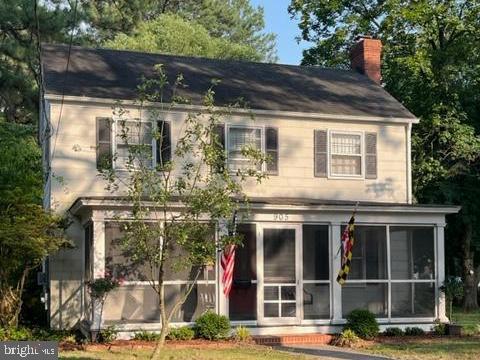 The seller has asked for best and final offers by noon Sunday 7/2. Colonial cottage in Salisbury's beloved Pinehurst neighborhood. Updated home with charm galore: original hardwood floors, chairrail & crown moulding, and arched doorways. Spacious living room w/fireplace. Formal dining room w/built-in corner cabinets. Updated bright & sunny kitchen - granite counters, stainless steel appliances, upgraded cabinetry, bamboo flooring - and a breakfast nook. Upstairs 2 roomy bedrooms w/hardwood floors, full bathroom. Large unfinished basement houses a half bathroom, laundry, & plenty of great storage space. Enjoy outdoor living on the screened porch or patio. Quick stroll to shopping, dining, and events in Downtown Salisbury or Salisbury University.