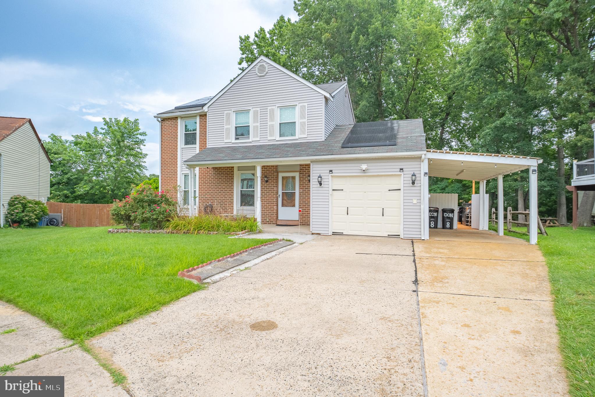 Stunning fully renovated 4BR/3.5BA home with over $150K in high-end updates. In 2020, complete interior/exterior transformation including gourmet kitchen, new roof, and modern HVAC. In 2024, updated bathrooms, elegant flooring, new windows, stylish fence, spacious decks, added carport, plus charming brick and gravel landscaping in backyard. In 2025, a gorgeous garden and tranquil fish pond create a serene outdoor retreat. Approx. 2,089 sq ft including finished basement with LED lighting perfect for entertaining. Conveys: Samsung TV in basement, primary bedroom TV, ambient LED lights, all wall pictures, living room furniture set, and small white outdoor table set. Large deck furniture and BBQ grill not included. Detached storage and outdoor port complete this exceptional package. Solar system leased and transferable to new owner. Move-in ready and sure to impress!