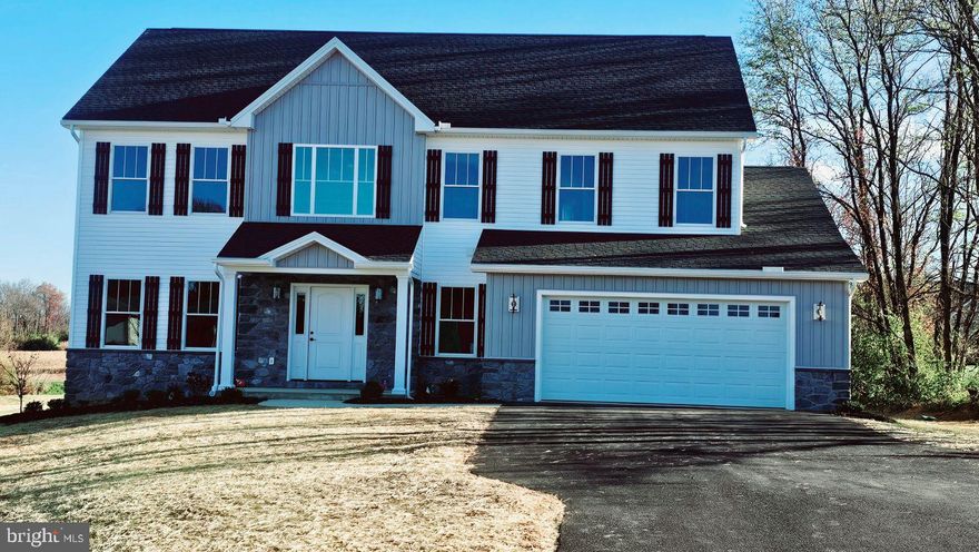 New Construction. Fully completed. Extras for this home include 2 color paint - ceiling white
upgraded trim package - high baseboards. upgraded cabinets in kitchens and bath. Fire place - rented gas tank in back . quarts countertops. higher weight carpet. LVP on main floor.  basement bathroom rough in. walk out basement. trex deck in the back