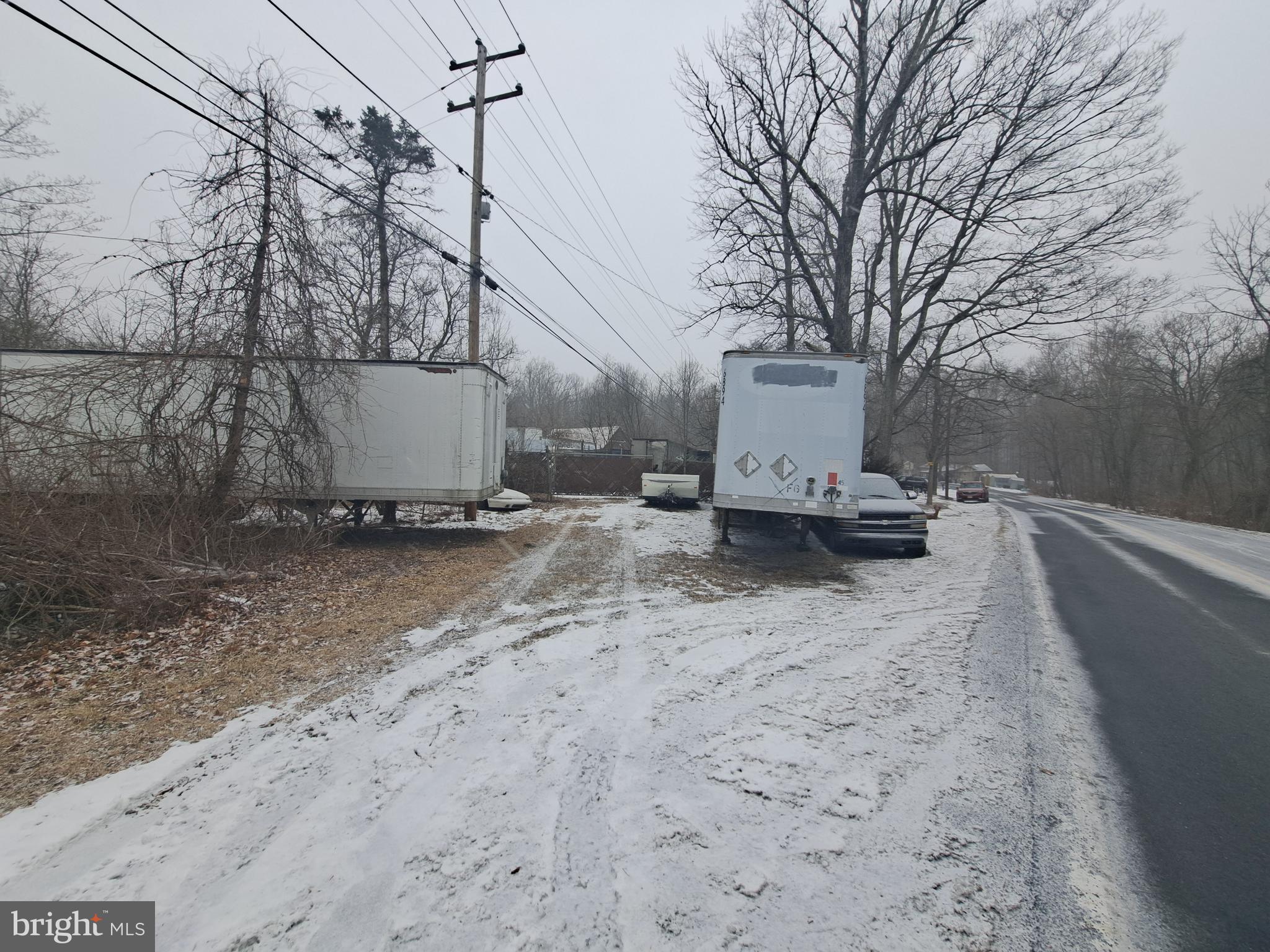 This unique property offers over 31 acres of land that is zoned for Auto Recycling/Junk Yard use. It is an ideal location for truck or equipment parking, making it perfect for businesses in need of storage space. The current owner is utilizing the property by parking tractor trailer boxes and other equipment, demonstrating its potential for various industrial uses.
With its vast size and zoning designation, there are numerous development possibilities for this property. Whether you are looking to expand an existing business or start a new venture, this property offers the space and flexibility needed to accommodate a wide range of projects.
Additionally, the location of the property provides easy access to major highways and transportation routes, making it convenient for businesses that require efficient logistics. Overall, this property presents a rare opportunity for investors or business owners looking for a versatile and expansive space to meet their needs.