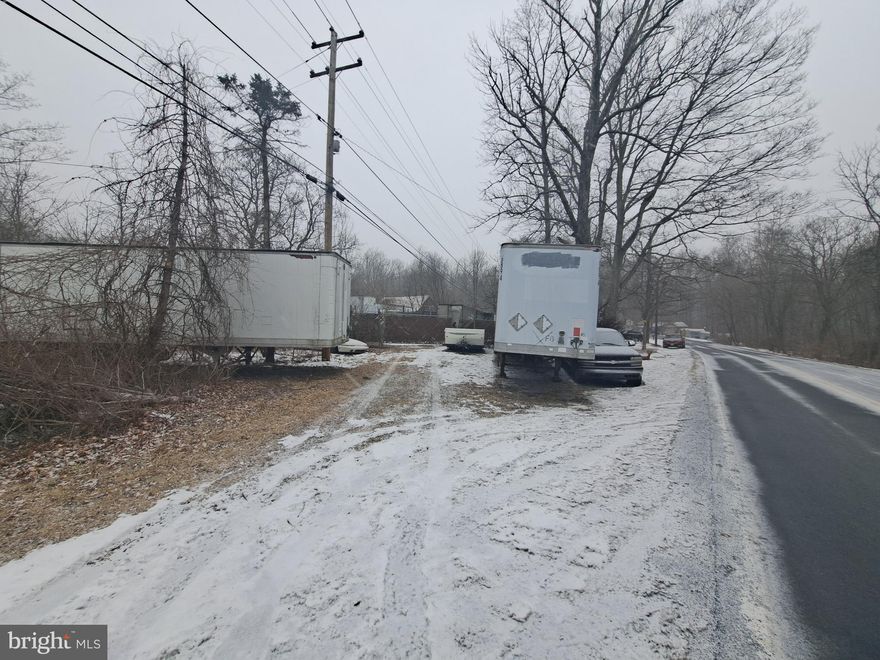 This unique property offers over 31 acres of land that is zoned for Auto Recycling/Junk Yard use. It is an ideal location for truck or equipment parking, making it perfect for businesses in need of storage space. The current owner is utilizing the property by parking tractor trailer boxes and other equipment, demonstrating its potential for various industrial uses.

With its vast size and zoning designation, there are numerous development possibilities for this property. Whether you are looking to expand an existing business or start a new venture, this property offers the space and flexibility needed to accommodate a wide range of projects.

Additionally, the location of the property provides easy access to major highways and transportation routes, making it convenient for businesses that require efficient logistics. Overall, this property presents a rare opportunity for investors or business owners looking for a versatile and expansive space to meet their needs.