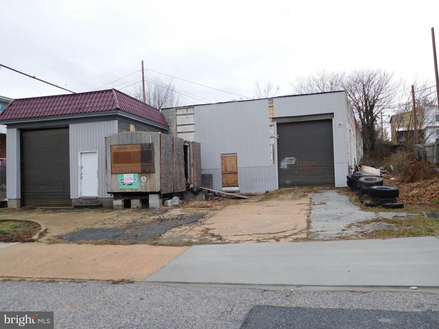Garage, storage use  . Owner to  clarify possible underground tank and remove.