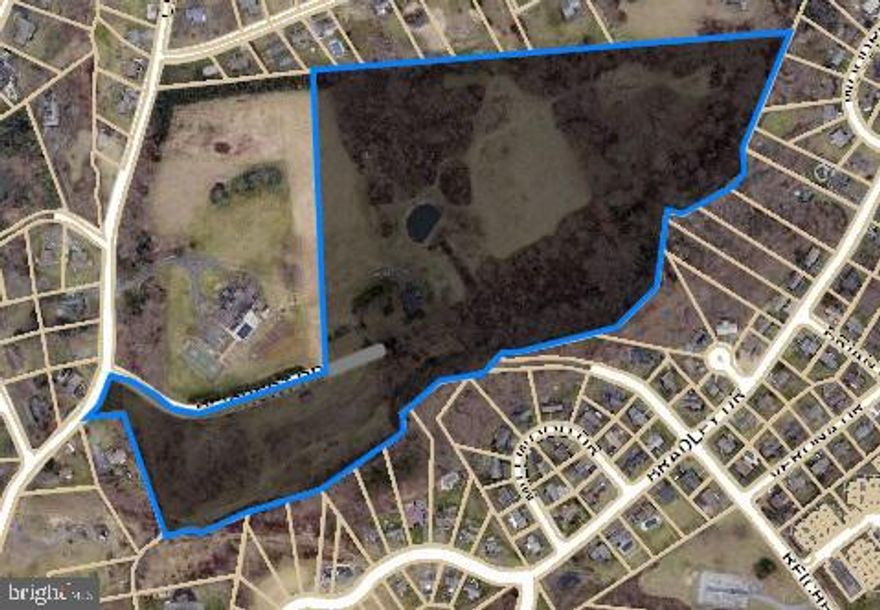 34+ acre site for housing subdivision with public water/sewer, and dry utilities.