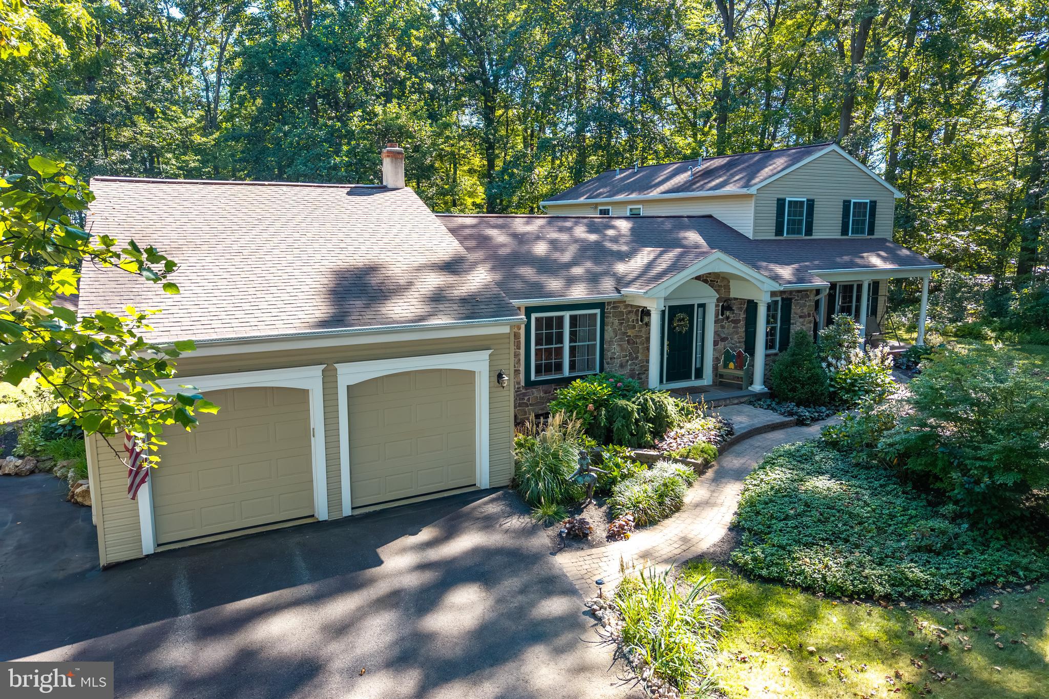 Nestled in the serene landscape of West Caln Township, this stunning traditional home, originally built in 1977 and thoughtfully renovated in 2004, offers a perfect blend of timeless craftsmanship and modern comfort. Spanning over 3,300 square feet, this spacious residence features six inviting bedrooms and five well-appointed bathrooms, ensuring ample space for relaxation and privacy. Step inside to discover a warm and welcoming interior, highlighted by rich hardwood floors and elegant ceramic tile. The heart of the home is the expansive kitchen, complete with a central island and stainless steel appliances. The adjoining formal dining room sets the stage for memorable gatherings, while the cozy living area, invites you to unwind after a long day. Retreat to the luxurious primary suite, boasting a walk-in closet and a spa-like bathroom. Additional highlights include a In Law Suite complete with a second kitchen, and entrance. The layout of this well done In Law suite allows owners to use this space as a true In law suite, rental or can be left as additional living space of the home. A partially finished basement offers endless possibilities including an optional 2nd laundry set up. Enjoy tranquil views of the surrounding trees and woods from your private backyard, creating a peaceful oasis. With an attached two-car garage and convenient driveway parking, this home combines functionality with style. Located in a rural setting, yet close to local amenities, this property is a true gem that embodies comfort and elegance. Experience the unique design and craftsmanship that make this house a place to call home.