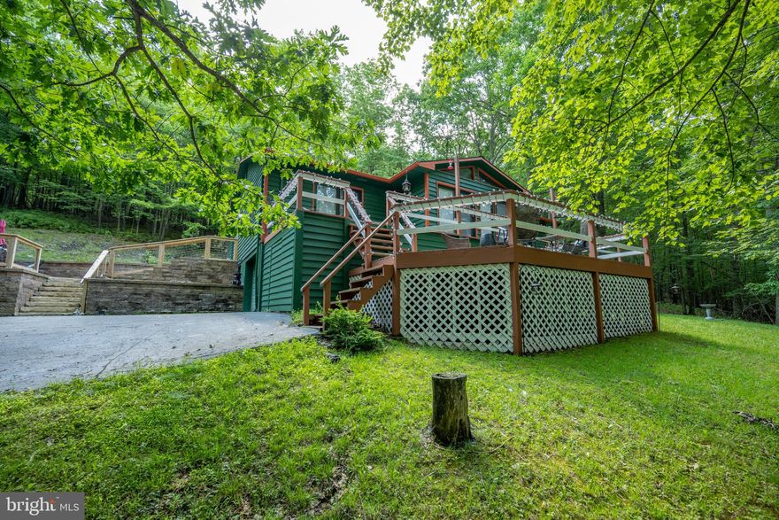 Welcome to 226 Bench Road in the coveted Sky Valley community at Deep Creek Lake! Enjoy an oversized, 1.38 acre lot with extended privacy and seclusion just a short golf cart ride to one of the best lake access points at the lake. This home offers 4 bedrooms and 2 full bathrooms on two levels of living. Many recent upgrades including Mini-splits for AC & additional heat source, patio and retaining walls with fire pit, flooring in basement, exterior painting and water heater! Home conveys fully furnished and ready for you to enjoy your time at the lake. Looking to have a boat to enjoy the water? Ask about the 2005 Bayliner boat that could be conveyed separately with the property.  Call today to schedule a private showing!