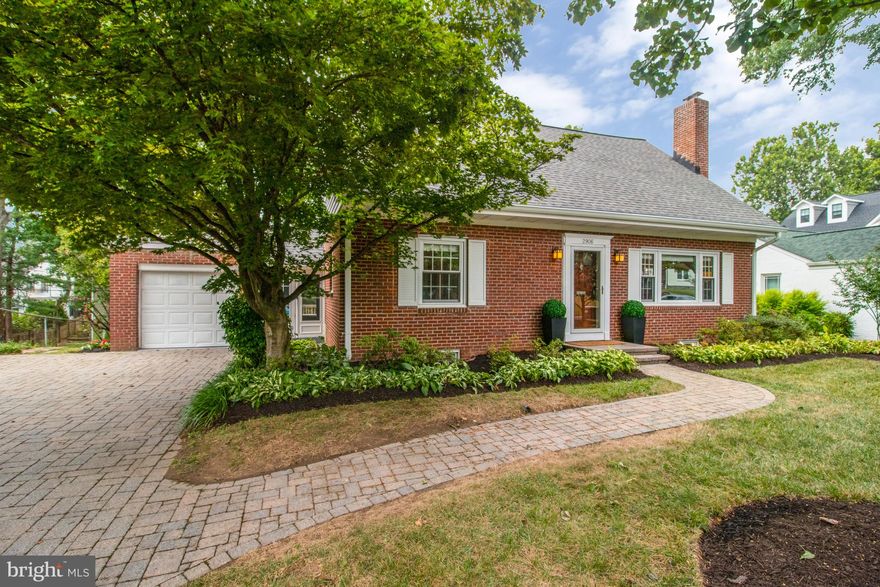 *Elegant* and *timeless* expanded 4-bedroom Cape Cod, nestled in the highly desirable Hillwood neighborhood of Falls Church. This home boasts over 2,200 sq ft of beautifully finished space on a spacious, flat .23-acre landscaped lot. A stunning paver driveway leads you to a welcoming central entrance. Inside, the main level impresses with an oversized living room featuring a cozy wood-burning fireplace, a separate dining room, and a spacious kitchen equipped with stainless steel appliances. A rare main-level bedroom with an en-suite bathroom completes this level. The central staircase takes you to the expanded upper level, which offers a large primary bedroom with abundant storage, two additional bedrooms, and a full bathroom. The finished lower level provides even more living space with a family room, a versatile flex room/guest bedroom, and a home office. Step outside to your private backyard oasis, where you'll find stunning trees and greenery, a spacious deck, and a lower patio—perfect for entertaining or enjoying fire-pit nights under the stars. Convenience is paramount with nearby access to shops, dining options, and the esteemed Saturday morning farmers market in Falls Church City. Outdoor enthusiasts will love the proximity to the WO & D bike path. Commuters will appreciate the ease of access to two metro stations, Reagan and Dulles Airports, and major routes such as 66, 495, 7, and 50, with downtown DC just 7 miles away. Additionally, this home is close to burgeoning mixed-use developments, including the exciting Founders Row, which will feature a movie theater and a brand-new Whole Foods at the intersection of E Broad and S Washington, just six streets away. Don't miss your chance to own this beautiful home in a prime location!