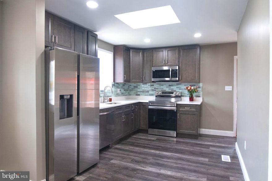 Gorgeous single family brick rancher that has been totally renovated in 2025 is being offered. This beautiful  3 bedroom 2 bath home features brand new LVP  floors through out, stainless steel appliances, granite counter tops, large main retreat, stunning bathrooms, 2 fireplaces, fully finished basement with separate entrance, and  stunning landscaping with built in pool in private backyard oasis. Home also has new roof, windows, central A/C and furnace, and hot water heater. Don't miss out, because this one won't last.