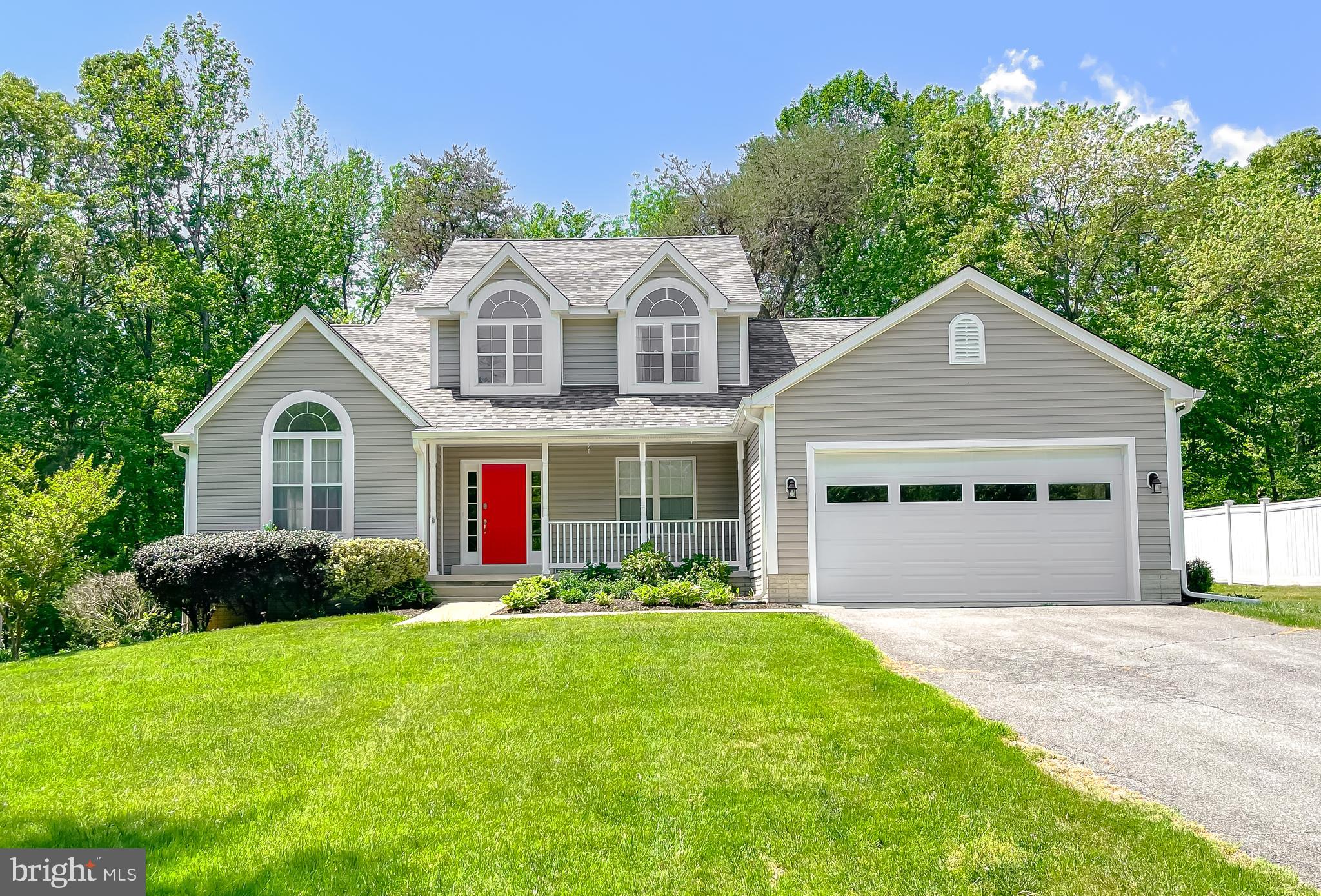 MOTIVATED SELLERS! LET'S MAKE A DEAL! Stunning 3-Level Home! Welcome to this beautifully maintained 4-bedroom, 2.5-bath home with a spacious 2-car garage, perfectly situated on a peaceful cul-de-sac. Step inside to a grand two-level foyer that opens to both a comfortable living room and a versatile office/den-ideal for working from home or relaxing. The living room seamlessly flows into the formal dining room, creating an inviting space for entertaining guests. The eat-in kitchen features abundant counter space, a generous pantry, and modern appliances that are just three years old. Enjoy hardwood floors and a cozy gas fireplace in the expansive family room, perfect for gatherings. The main-level master suite offers a walk-in closet and a luxurious ensuite bath with dual vanities, a soaking tub, and a separate shower. Upstairs, you’ll find three additional spacious bedrooms and a full hall bath, providing plenty of room for family or guests. The walk-out basement is unfinished with a rough-in for a future bath, offering endless possibilities for customization. Relax on the brand-new, oversized screened-in deck or unwind in the new hot tub-ideal for enjoying quiet evenings outdoors. Additional updates include a recently replaced roof (within the last year), ensuring peace of mind for years to come. This exceptional home combines comfort, style, and functionality in a sought-after location. Don’t miss your chance to make it yours!