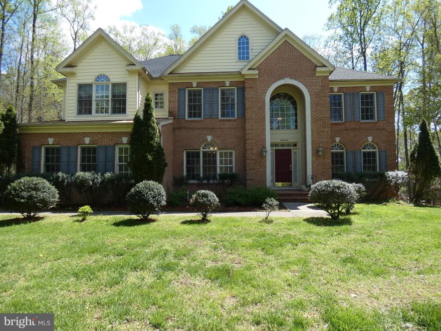 Magnificent and Elegant Single Family Home on a 2.5 Acres Lot with Private Gated Entry. Grand 2-Story Foyer, Gorgeous and Stunning Contains Over 5600 Sq Ft with 5 Bedrooms, 4.5 Baths and 3 Car Garage. Hardwood Flooring on Main Level, Gourmet Kitchen Features Large Island and Cooktop, Granite Countertop, Beautiful Cabinets and Connection to Bright Morning Room, Recessed Lightings, Library, Formal Dining, Living and Sunny Family Room with Fireplace. Lot of Spacious Interior and Generous Rooms. Huge Master Suite Featuring a Sitting Room, Dual Walk-In Closets, Dual Sink Vanity, Separate Shower, Jacuzzi Tub Create a True Oasis. Upper Level Jack-N-Jill Bath and One Bedroom with Private Bath. Fully Finished Spacious Basement with Full Bath, Rec Room, Extra Rooms for Guests and Walk-Out to Stone Patio. Extra Large Deck Perfect for Entertaining. Enormous Backyard Amazing Views of the Woods. Professional Design Landscaping and Irrigation System. Convenient Locations, Close to Schools, Shopping and Restaurants, Easy Access to Major Commuter Routes. You're Buying a Lifestyle and Make It Yours Today! Text William for Questions.