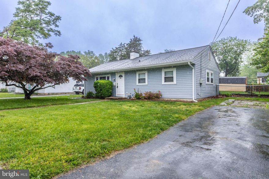 Welcome to 41 Moyer Drive, an updated rancher that is move in ready! Enjoy brand new luxury vinyl plank flooring flowing through the living room, kitchen, and hallway—durable, low-maintenance, and full of charm. The kitchen shines with a contemporary backsplash, gas range and access to the exterior. Fresh, neutral paint and brand-new carpet provide a clean canvas ready for your personal touch. There is a  renovated full bathroom, new front and back doors, some replacement windows, new roof in 2023 with a transferable warranty, plus new vinyl siding, offering peace of mind and curb appeal. Out back, unwind or entertain on the large concrete patio—partially covered for year-round enjoyment—with a fenced rear yard and shed for added storage. Close to major commuting routes, this move-in-ready home combines comfort, convenience, and value in one inviting package.