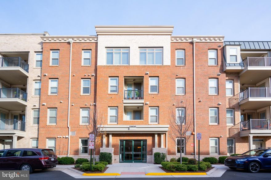 Highly sought-after Condo unit in Birchwood at Brambleton - Loudoun County's TOP RATED 55+ Active Adult Community. This is an incredible opportunity to own a RARELY available  3rd floor condo with EXTENDED 1-Car Garage in Birchwood. This home shows like new and has been meticulously maintained by its original owner. This spacious, 1-level Condo boasts over 1518 square feet, 3 bedrooms, 2 full bathrooms, and welcomes an abundance of natural light through its open concept floorplan. The luxury gourmet kitchen features upgraded cabinetry, stainless steel appliances, double oven, granite countertops, stainless farm sink, and modern finishes. Stunning wide plank engineered hardwood flooring runs throughout the main living area which features a huge Great Room with 9 ft ceilings and a wall of windows, Dining Room, and Sitting Area. Enjoy your morning coffee on your very own private balcony. The huge Primary Bedroom is certain to impress with its high ceilings, walk in closet with custom shelving, and a modern style en suite Primary Bathroom. The two secondary bedrooms are perfect for Guests, or for a work-from-home Office Space! HOA Fees include Cable and High Speed Internet wtih Verizon FiOS. Birchwood at Brambleton's amenities are truly awe-inspiring , and they include a 20,000+ sq ft Clubhouse, Indoor + Outdoor Pools, Bocce + Pickleball courts, Fishing Pond, Indoor/Outdoor Bars, Golf Simulator, Movie Room, Party Room upstairs and more! WELCOME HOME!!