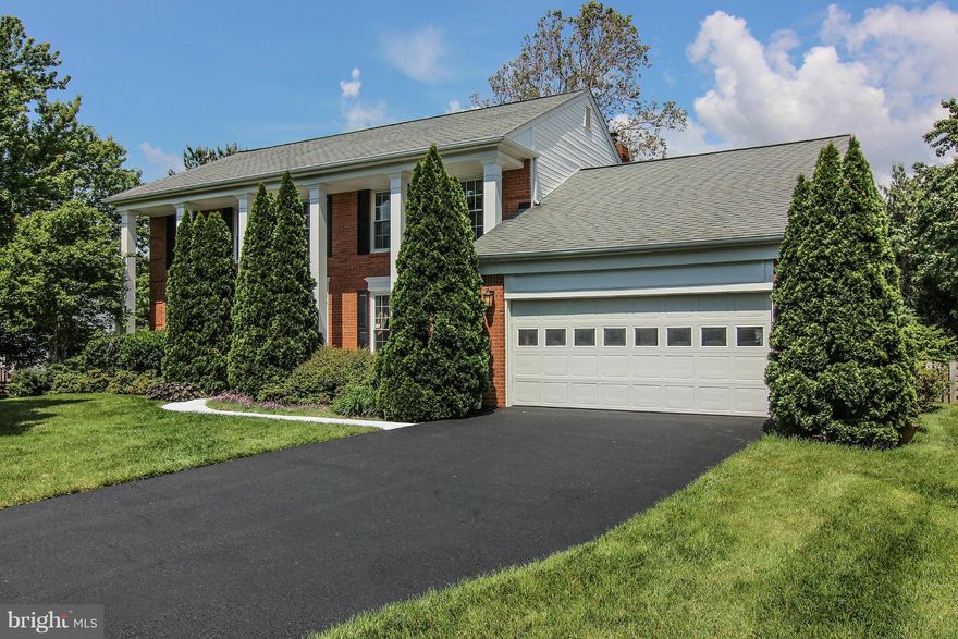 Spectacular brick home on over 1/2 acre lot in Countryside. 2 garages, 5 bedrooms,w/new carpet, 3.5 baths &updated, formal living/dining rooms, gourmet kitchen w/ granite counters and ss appl, huge family room w/ wood burning fireplace, office with french doors, hardwood floors,   fully finished walk-out basement, beautiful deck & patio, well maintained landscaping, new HV/AC. Water heater 2 yrs.