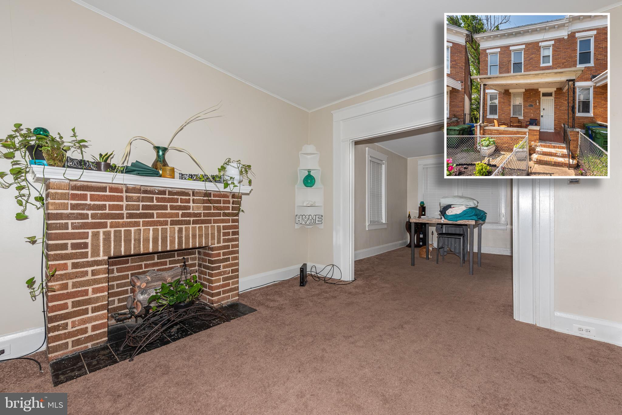 TURN KEY PORCH FRONT ROWHOME WITH 3 FINISHED LEVELS OF LIVING SPACE! Main level features a spacious living room with a decorative fireplace, separate dining room, and a galley kitchen, upper level with 3 bedrooms and 1 full bath, finished basement with a family room, laundry room, a main level rear deck, and a fenced yard! Sold As-Is
