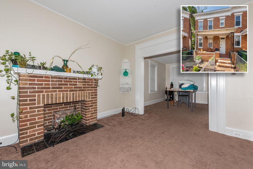 TURN KEY PORCH FRONT ROWHOME WITH 3 FINISHED LEVELS OF LIVING SPACE!  Main level features a spacious living room with a decorative fireplace, separate dining room, and a galley kitchen, upper level with 3 bedrooms and 1 full bath, finished basement with a family room, laundry room, a main level rear deck, and a fenced yard! Sold As-Is