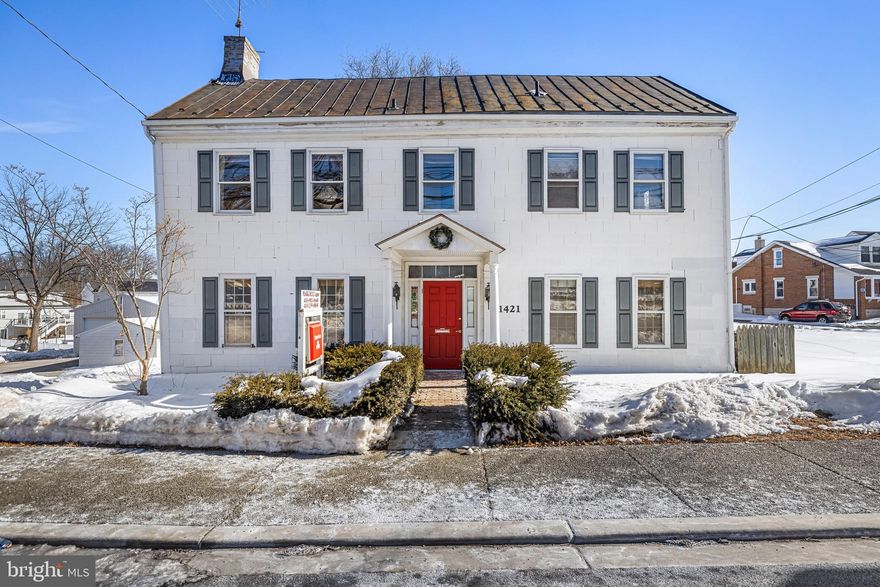 Don't miss this outstanding opportunity to own one of the oldest homes, prominently positioned along Main Street with exceptional visibility.  This unique property is partially occupied by a State Farm Insurance office and offers incredibly versatility with C-3 zoning, allowing for a wide variety of commercial and mixed-use possibilities.  The property features ample parking, generous road frontage and is additionally configured with multiple efficiency-style units, creating potential for income production or flexible business use.  Buyer is responsible for verifying intended property use with zoning.  Schedule today! Sold As-Is.