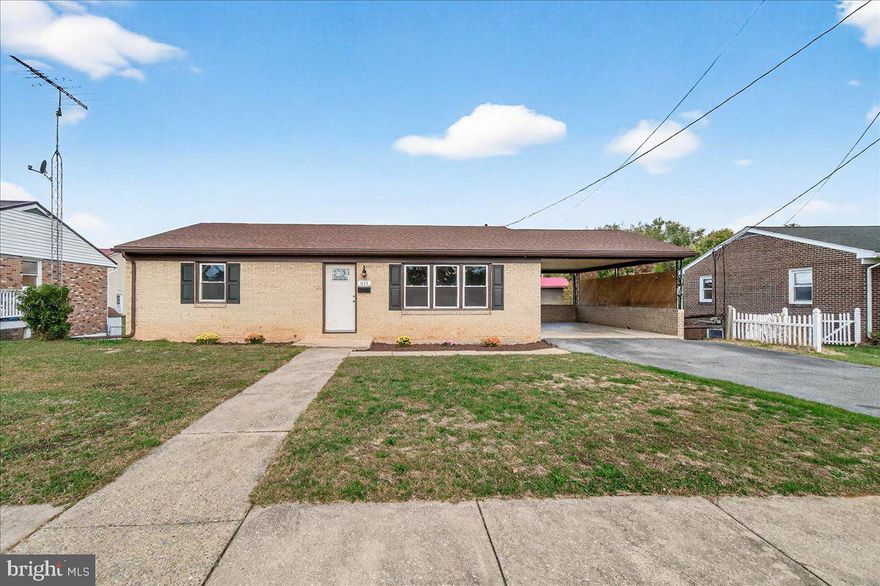 You'll want to take a look at this beautifully updated 3 bedroom, 1 bath all brick rancher with over a 1/4 acre! Updates performed in 2021 included a new roof, windows, heat pump, kitchen cabinets, stainless appliances, granite countertops, luxury vinyl tile in the kitchen & bath and refinished hardwood floors throughout the rest of the home. Great commuter location with quick access to I-81 & I-70 and close proximity to shopping, schools & downtown activities. Covered carport for parking or outdoor gatherings and off-street parking. Lots of additional space in the unfinished basement w/ access to rear yard. Alley access in rear of property.