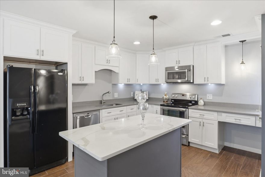 Welcome home to this light-filled, single-level residence offering approximately 1,200 square feet of comfortable living space and a beautifully open floor plan designed for both everyday living and effortless entertaining.
At the heart of the home, the stunning, updated kitchen features an impressive oversized island that naturally becomes the gathering place for friends and family—perfect for hosting memorable get-togethers.
This well-appointed home includes three spacious bedrooms and two fully updated bathrooms, along with updated flooring and newer windows (2018) that enhance both style and energy efficiency.  The owner has taken pride in the selection of some quality light fixtures, ceiling fans and drapery hardware. An expanded laundry closet with built-in cabinetry adds valuable storage and everyday convenience.
Enjoy two convenient entrances to the home: enter through the charming courtyard, beautifully landscaped with flowering trees and benches, or access the unit directly from the parking area—ideal for easy, stair-free entry and flexible living.
Located in the highly sought-after community of The Westerlies of McLean, residents appreciate both the prime location and the  McLean High School pyramid. Everyday conveniences are right across the street, including grocery stores, gas stations, and restaurants, while the Silver Line Metro is less than a mile away.
Commuters will love the quick access to major routes such as the Capital Beltway and the Dulles Toll Road, making travel throughout the region convenient. 
Just minutes away, the vibrant Tysons / Route 7 corridor offers exceptional shopping, dining, and entertainment options.
Community amenities include an outdoor swimming pool,  basketball court, and a tot lot with swings, along with ample open parking for residents and guests.
This home offers the perfect blend of space, convenience, and lifestyle in one of McLean’s most desirable communities. 🏡✨