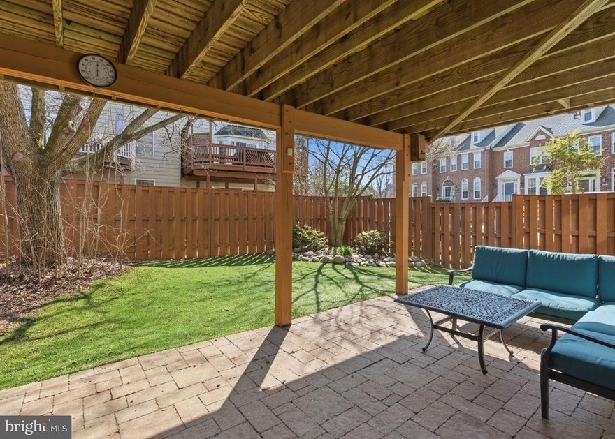 Sun-drenched brick-front end-unit townhome available in the desirable Cascades Community. 

This beautifully updated end unit townhome features three levels of comfortable and convenient living. The main floor features a living room, powder room and updated eat-in kitchen with gorgeous cabinetry, stainless steel appliances, and new kitchen flooring (2026) as well as access to the large deck. Windows updated 2025!

Upstairs are three bedrooms including the spacious primary suite offering a remodeled bath with a walk-in shower, dual sink vanity and walk-in closet. An updated hallway bath completes the floor. The finished walkout lower level includes a large rec room, fourth bedroom, and an additional full bath.

 A private, fully fenced backyard with patio, shed, and low-maintenance artificial turf completes the home. Conveniently located near Algonkian Park, schools, and shopping, this home is ready to be yours! Welcome home to Broadspear Terrace!