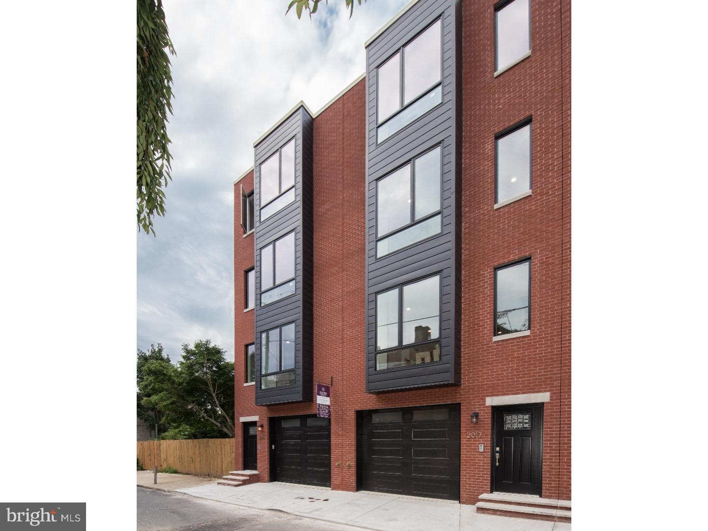 This New Contemporary Luxury Town Home located in the Art Museum Area is approximately 3,672 square feet. 3 bedrooms, 3 bathrooms, 2 car garage, oak floors throughout. Living room has built in bookshelves with fireplace. Master bedroom has fireplace, en suite bathroom and walk-in closet. Room off the master bedroom can be used for office or sitting room. Roof deck with city views. Still time to customize kitchen, bathroom tiles and stain of oak floor. 10 year tax abatement (pending).